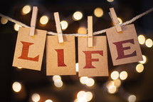 word life hanging on clothes pins 