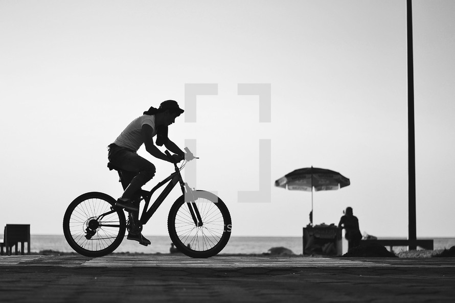 silhouette of a cyclist
