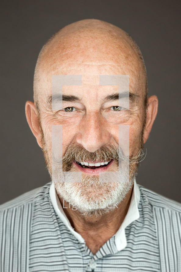 headshot of a senior man 