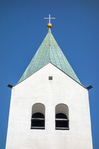 steeple in a blue sky