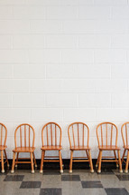 Row of wooden chairs.
