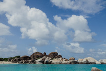 rocks along the shore of an island 