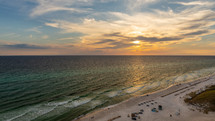 Sunset over white sand beach in Florida