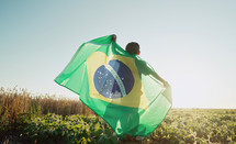 Brazilian little kid with flag