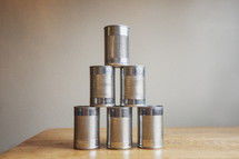 stack of plain tin cans