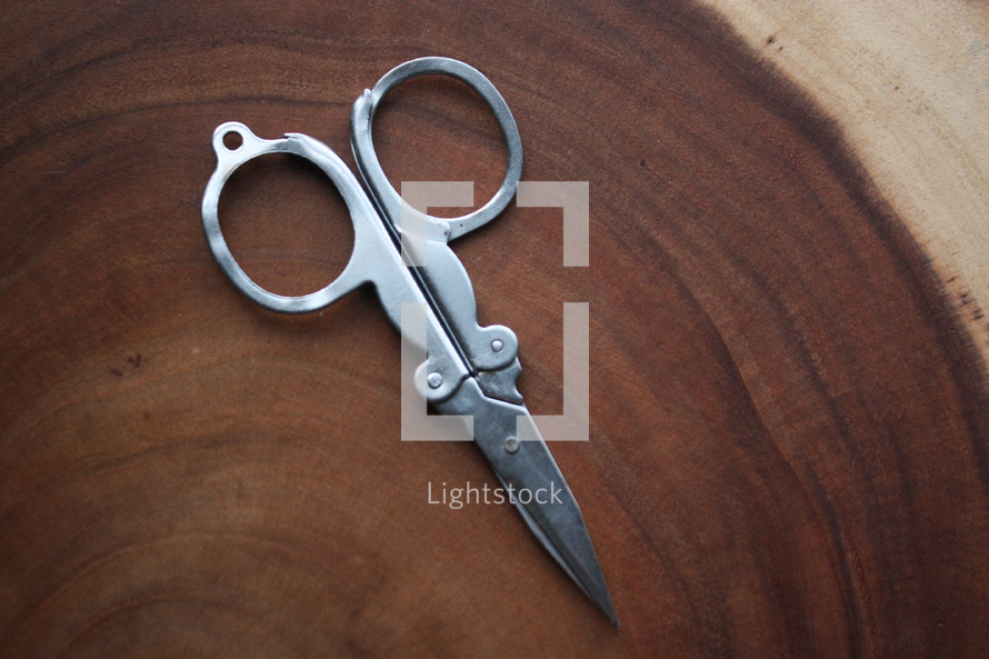 scissors on wood 