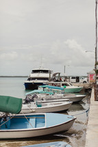 boats tied to a dock in the Bahamas