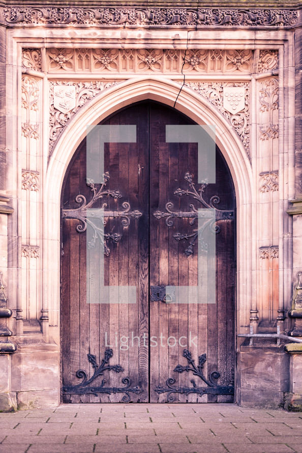 ornate brackets on a door 
