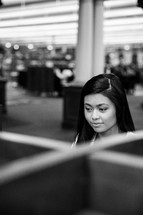 woman in a cubicle in a Library