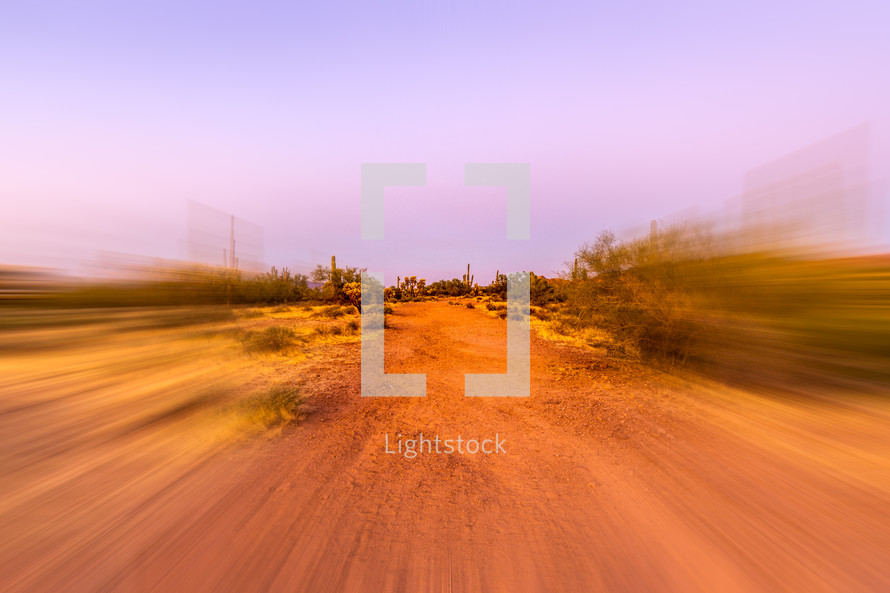 Desert dirt road motion blur