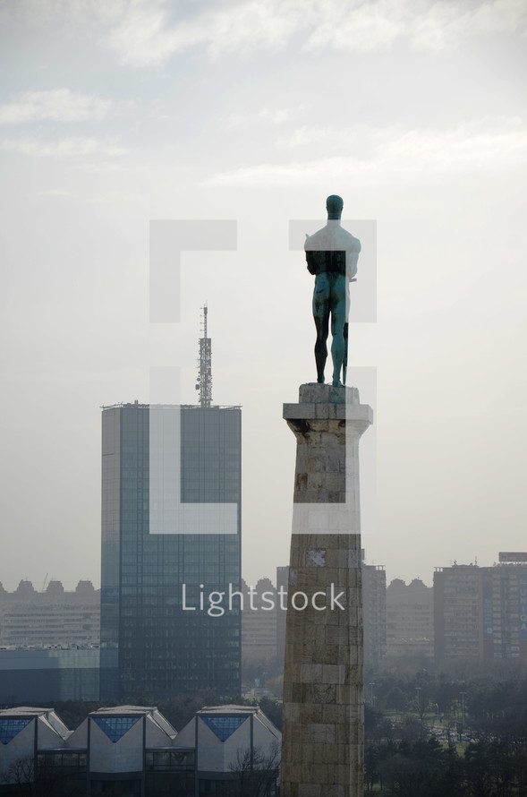statue of victory on a tower 