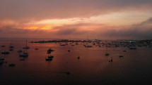 boats in a bay at sunrise 