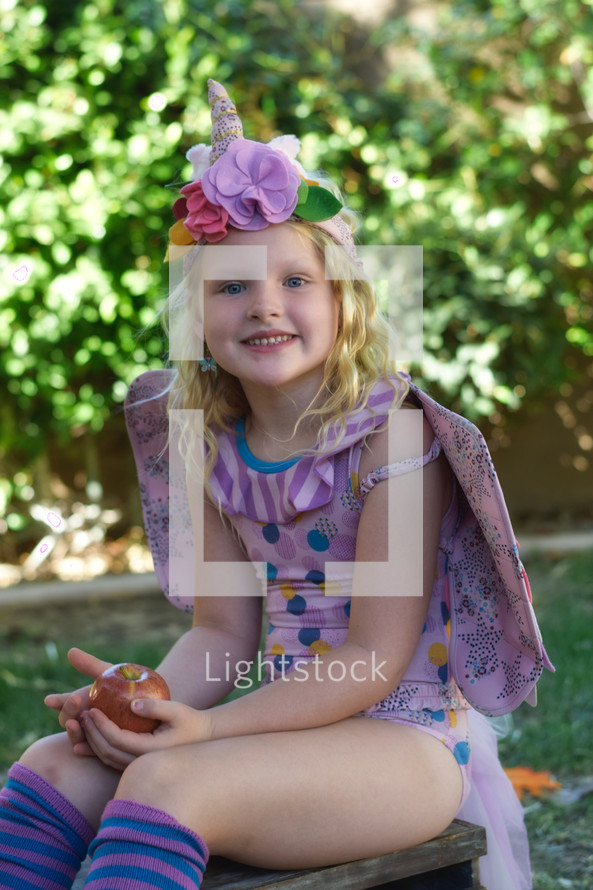 girl child in a uniform costume 