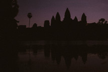 dusk and silhouette of ruins in Cambodia 