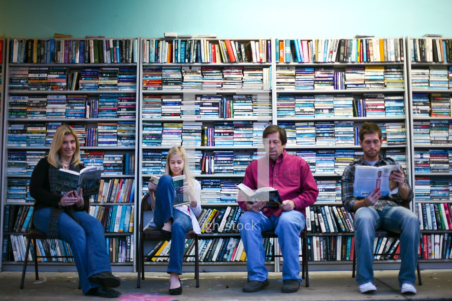 people reading in a library 