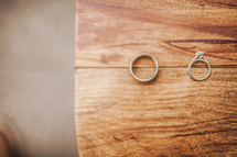 Wedding rings on wood table