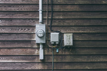 electric meter on an exterior wall 