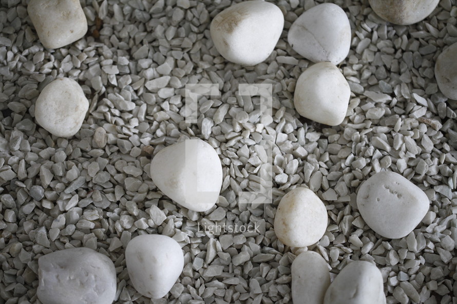 white stones on crushed granite 