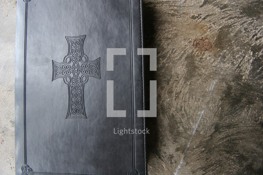 Cover of bible with cross embossed
