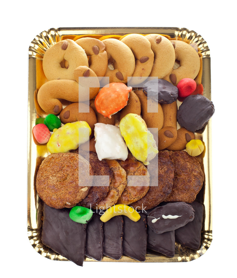 Mix of pastries and cookies in the tray.