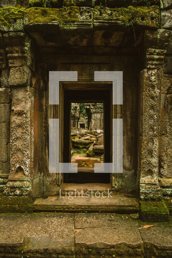 entrance to a temple in ruins  in Cambodia 