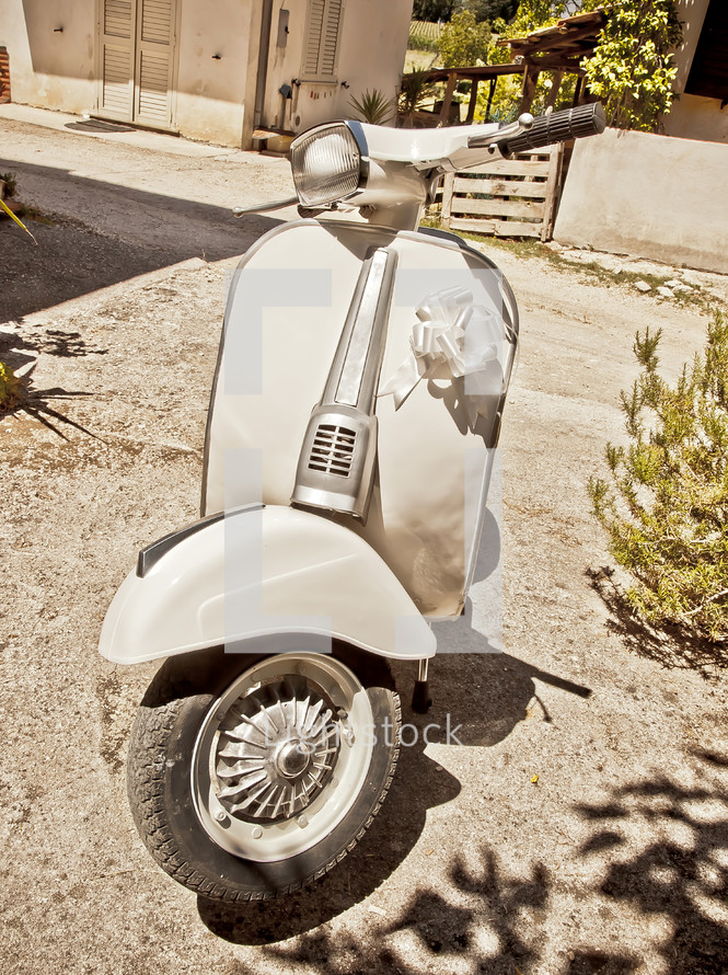 Vintage Italian scooter, the famous vespa used for the wedding day.
