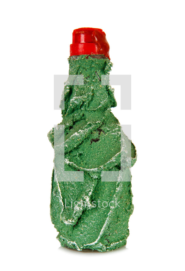 green mini bottle on white background