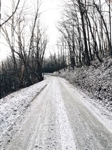 snow on a dirt road 