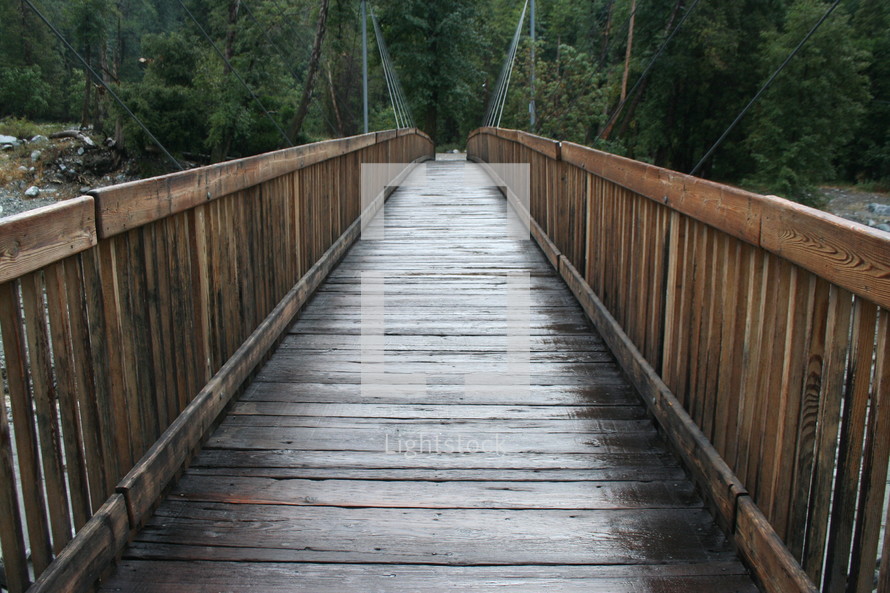Wooden bridge over water
