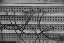 Connecting wires on a telephone switch board 