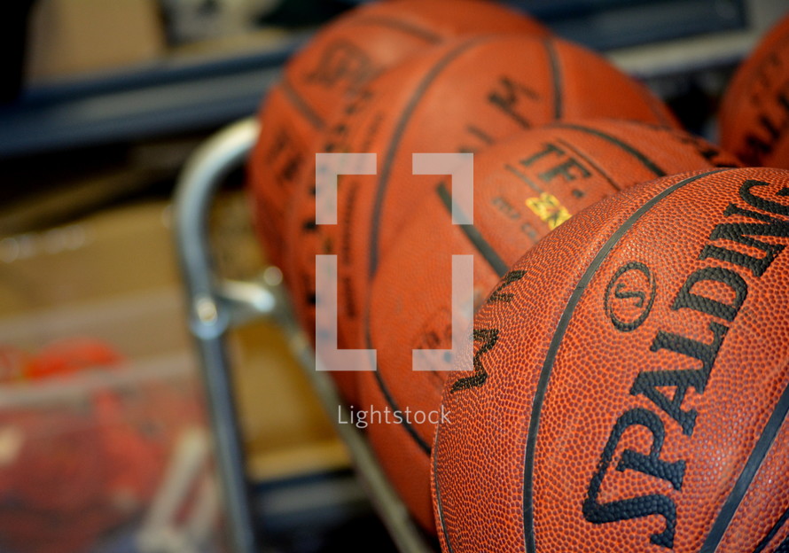 basketballs on a rack 