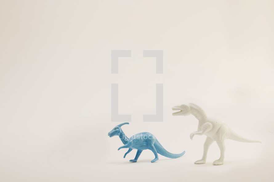 dinosaur figurine on white background 