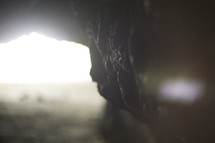 light at the entrance of a cave 