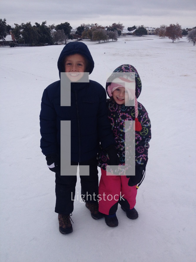 Children in snowsuits 
