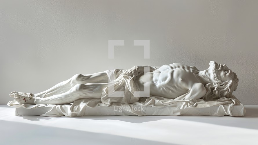 Statue of Jesus Christ laying down.