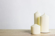 white candles and white background 