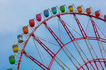 colorful seats on a ferris wheel 