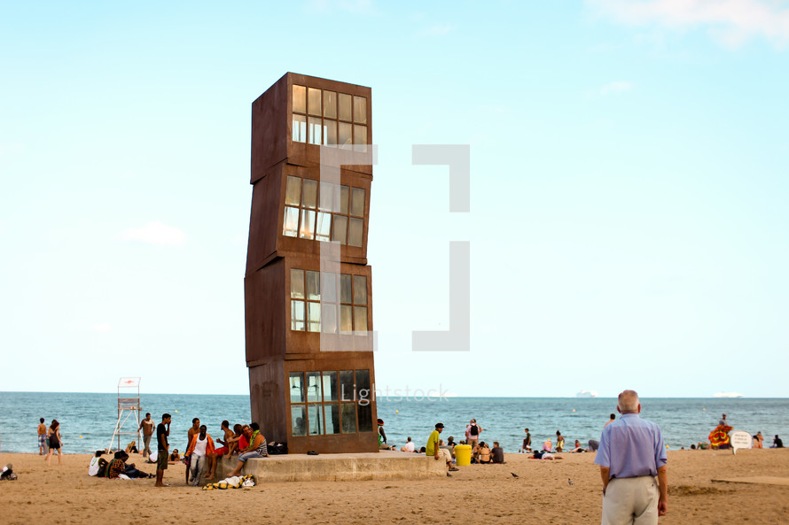 "Homentage a la Barceloneta" designed by Rebecca Horn, is planted firmly in the middle of the beach. 
