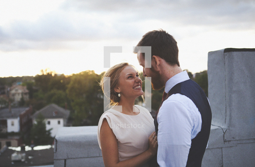 Happy couple on rooftop
