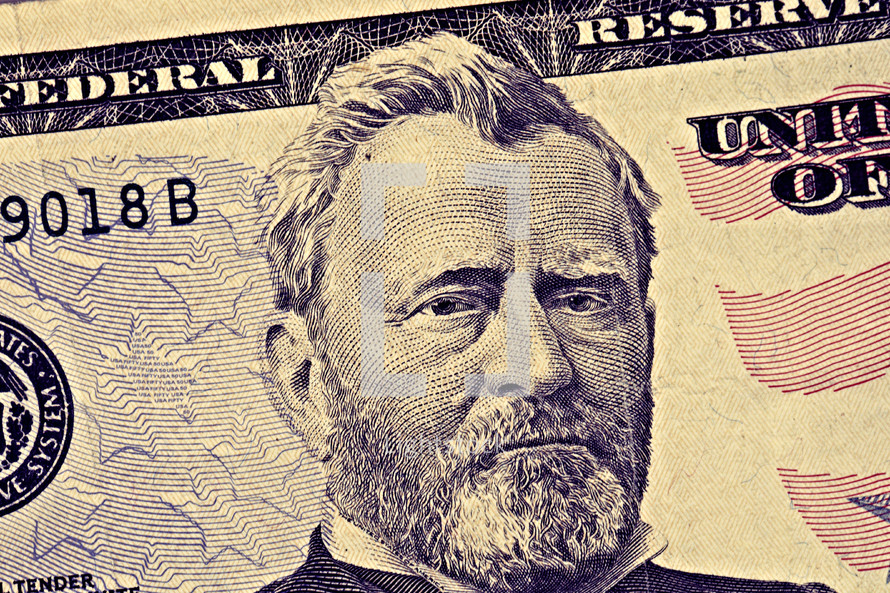 A closeup of a fifty dollar bill
