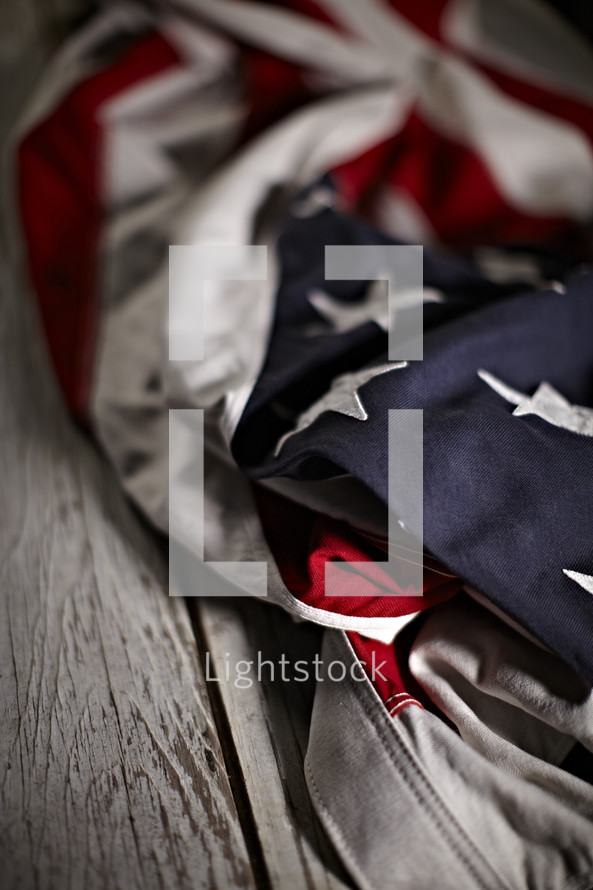 A crumpled up American Flag