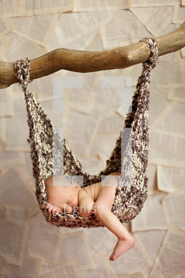 Newborn lying in hammock