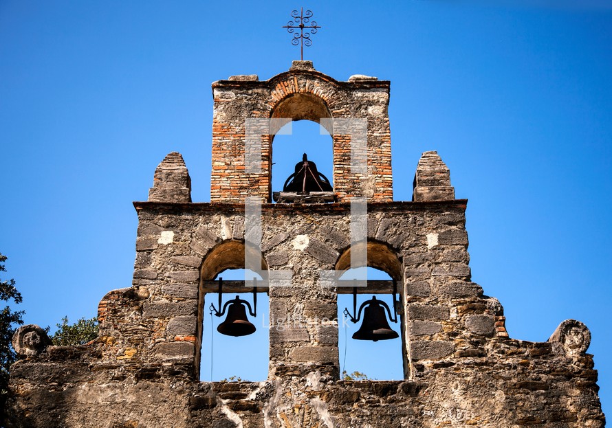 bells in ruins of an old bell tower 