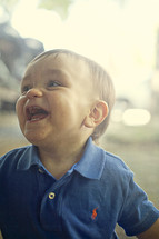 giggling toddler boy
