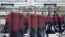 Wine bottle production line. Technological line for bottling of wine. Production of glass wine bottles.