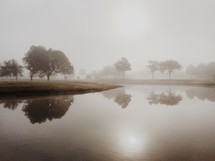morning fog over a pond 