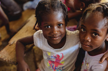 children hugging in Haiti 