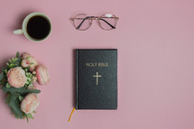 Bible on a pink background 