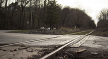 train tracks across a road 