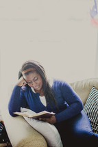 African-American woman reading a Bible